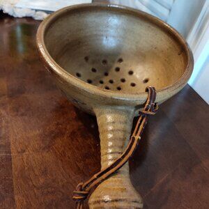 Vintage pottery strainer